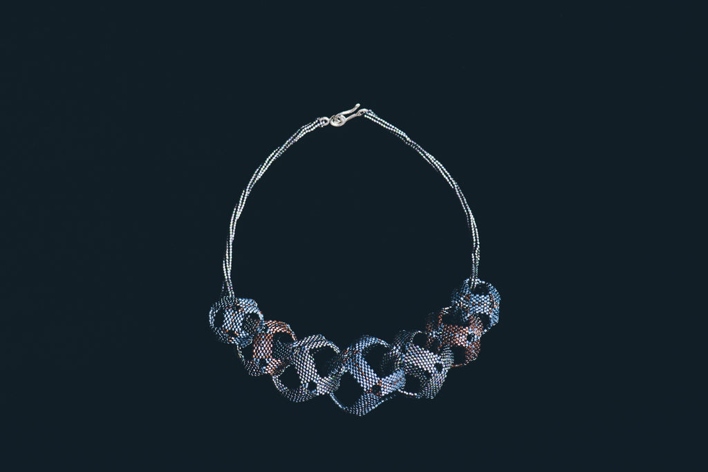 Intertwined blue necklace