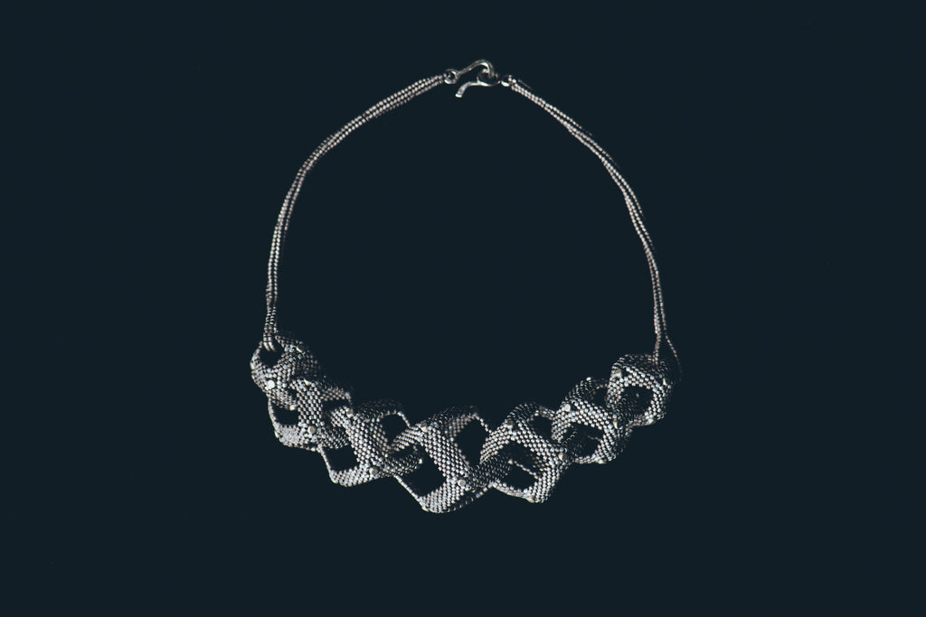 Intertwined silver necklace